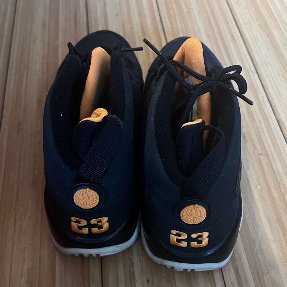 Jordan Kids Black and Gold Sneakers